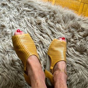 Earth shoes…super comfy!  Great gold tone!